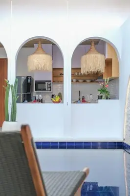 a kitchen with a table and a chair in a room at T&J6 - Gorgeous 1BR pool villa, walk to beach! in Umalas