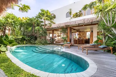 a pool in the backyard of a villa at Villa Belle Oasis - Next To Canggu 5BR Tropical Paradise with Private Pool & Stunning Rice Field Views in Kerobokan