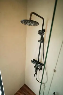 a room with two lights on a wall at Canggu Zen Villa - 2 BR Villa in Berawa in Canggu