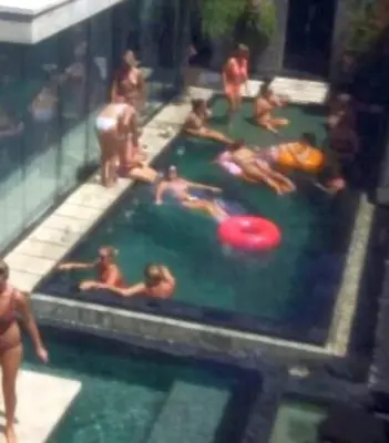 a group of people in a pool with a frisbee at Le Retreat Canggu, 3BR Luxury Villa, Bali's Best Location in Canggu
