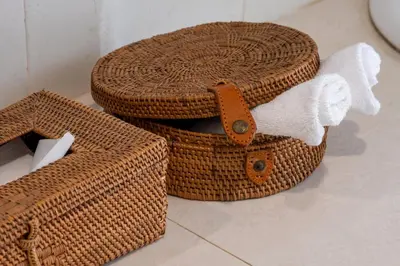 two wicker baskets with towels on top of them at Villa Yuhi in Seminyak