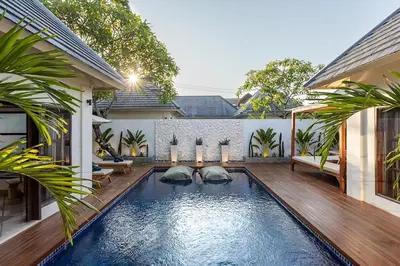 a swimming pool in the backyard of a house at Villa Dalon by Optimum Bali Villas in Seminyak