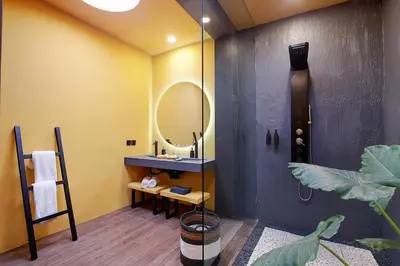 a bathroom with a sink and a mirror at CANGGU BRAND NEW 6Bed VILLA! BEST LOCATION! A STEP-FREE Design Highlight for Families & Friends in Canggu