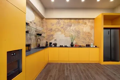a kitchen with yellow cabinets and a mural on the wall at CANGGU BRAND NEW 6Bed VILLA! BEST LOCATION! A STEP-FREE Design Highlight for Families & Friends in Canggu
