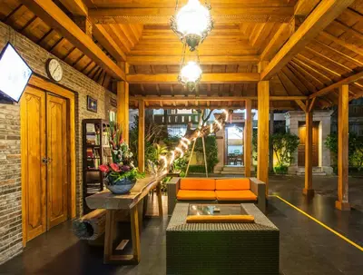 a living room with a giraffe statue in a building at 6-BR Garden Legian Villa 5-Min Walk to Beach and Shops Bali in Seminyak