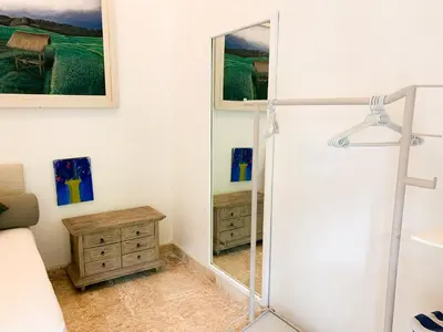 a bathroom with a shower and a mirror at Tropical Oasis 2 BR Villa - Near Beach in Seminyak