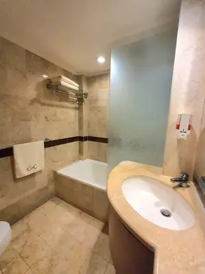 a bathroom with a sink and a bath tub at C&C Apartment Jayakarta Residence Legian Bali A 6319 in Seminyak