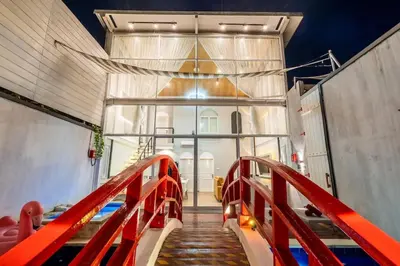 a staircase leading up to a building with a glass door at Luxury Villa Belvedere Bali in Seminyak in Seminyak