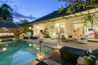 a house with a swimming pool in a yard at Villa Bloom 3 - Coastal Beach Villa 2 brm Sleeps 4 SEMINYAK BEACH in Seminyak