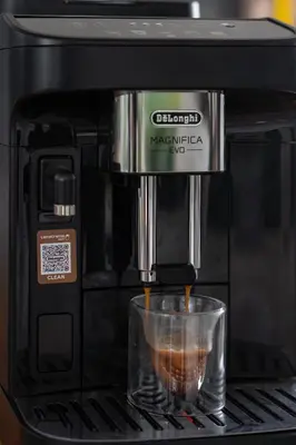 a coffee maker is making a cup of coffee at Villa Soluna Luxury 4BD Villa with Pool & Zen Vibes in Seminyak