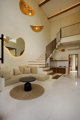 a living room with a couch and a table at Villa Batu Putih 2 Seminyak - No FLOOD in Seminyak