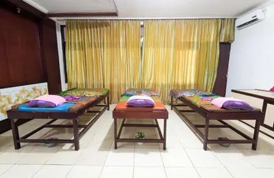 a room with three beds with pillows on them at One BedRoom Villa with Private Pool near DPS Airport in Kuta