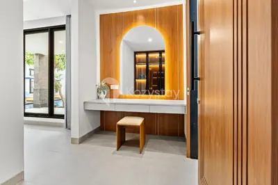 a bathroom with a sink and a mirror at Kros Villa by Kozystay - Legian in Legian