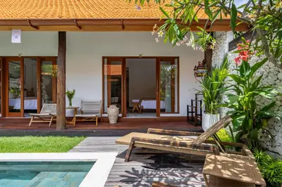 a villa with a swimming pool and a patio at Villa Marsin Umalas - 10 Minutes to Finns Beach Club in Seminyak