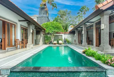 a swimming pool in the backyard of a villa at Lacita Villa Seminyak in Seminyak