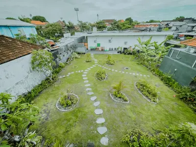 an aerial view of a garden with rocks and plants at Pachira Living Legian in Legian