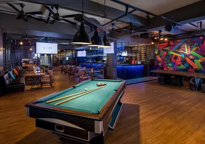 a billiard table in a room with a pool table sidx sidx at Viva Dash Hotel Seminyak in Seminyak