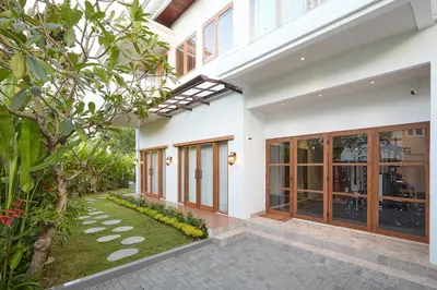 an external view of a house with a courtyard at Fale Seminyak - Brand New Modern Luxury 5BR Villa in Seminyak with Private Pool, Gym & Massage Room in Seminyak