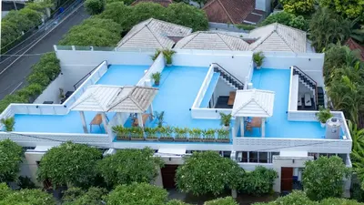 an aerial view of a blue building at Villa Bali Road House Seminyak in Seminyak