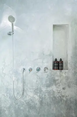a bathroom with a shower with a shower head at Villa Sassy - Stunning Private Award Winning Seminyak Oasis in Seminyak