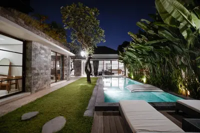 an image of a swimming pool in the backyard of a house at Villa Duadewi 3BR in the Heart of Seminyak by Santi Management in Seminyak