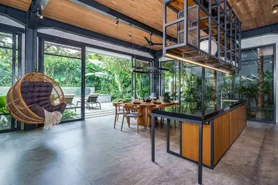 a living room with a table and chairs and a dining room at Family Luxury 5bd Villa Parking X Walk 2 Potato Head in Seminyak