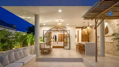 a villa with a kitchen and a living room at Villa Unna in Canggu by Elite Havens in Canggu