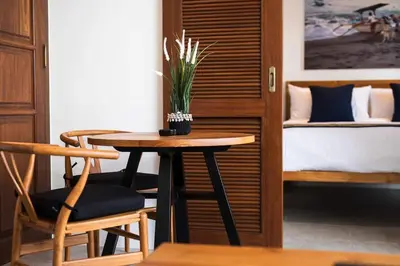 a small table with a plant on it in a room at Gorgeous 1 Bed Pool Villa, Walk to Beach, Shops in Seminyak