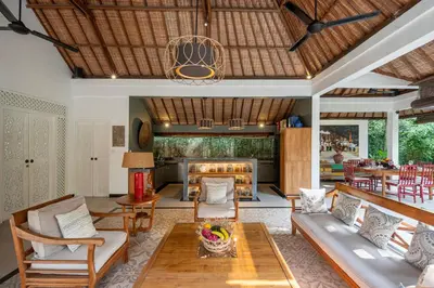 a living room with a couch and a table at Tropical Oasis of Calm in the Heart of Seminyak, 4BR Villa Luisha in Seminyak