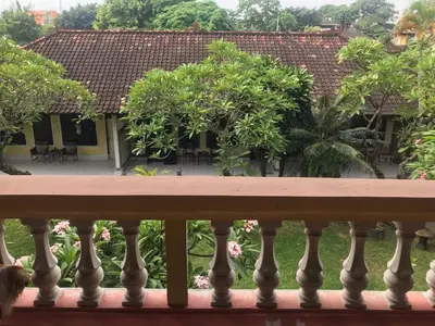 a view from the balcony of a house at Nyoman Legian House in Legian