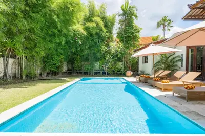 a swimming pool in the backyard of a villa at Villa Vista 2 Seminyak in Seminyak