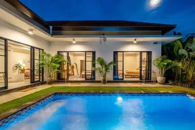 a swimming pool in the backyard of a villa at New Villa in the best area in Kuta