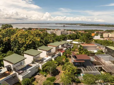 an overhead view of a city with trees and buildings at Spring Villa Nusa Dua in Nusa Dua