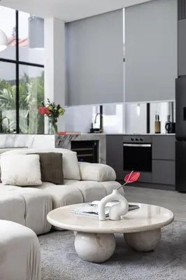 a living room with a couch and a coffee table at Brand New Luxury 5 Stars Designer Villa by Amare Villas in Kerobokan