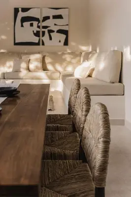 a living room with a couch and a wooden table at 3 Bathroom Bali villa in Kerobokan