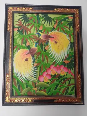 a picture of two white birds in a painting at Designer Alex Villa Jimbaran Bali in Jimbaran