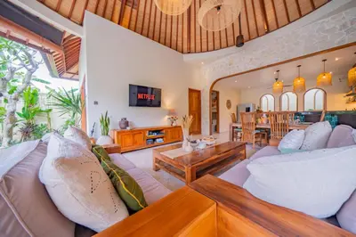 a living room with a couch and a table at Luxury Balinese Oasis with private pool - 2 BR in Kerobokan