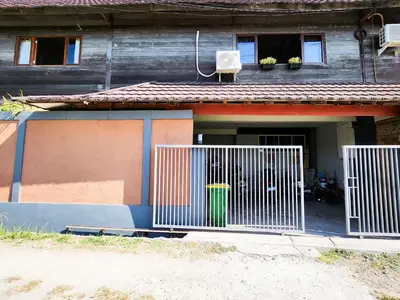 a house with a gate in front of it at Serai House 2BR Cozy Kerobokan Home in Kerobokan