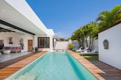 an indoor swimming pool in a villa at Villa N'Zo By DreamAwayBali in Seminyak