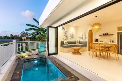 a house with a swimming pool on a balcony at NEW! Villa Theo - 1BR Villa in Kerobokan in Seminyak