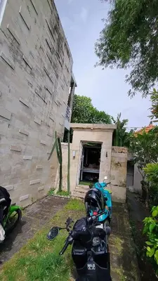 a motorcycle parked in front of a building at Villa Velia 3BR private pool in Badung