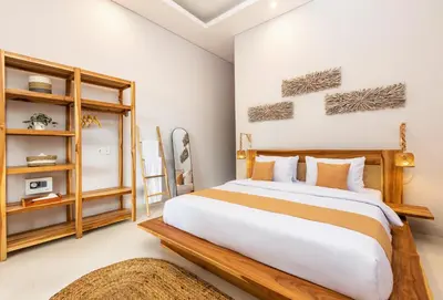 a bedroom with a large bed in a room at Villa Lavinia - Private Pool Villa - Seminyak Kuta - Double Six Beach in Seminyak