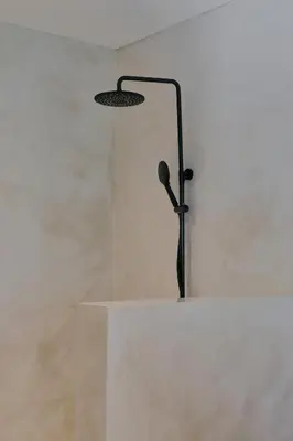 a light on top of a white wall at Villa Bali Manis by The Bali Agent - Central Seminyak 4BR Villa with Private Pool, Perfect for Families & Groups in Seminyak