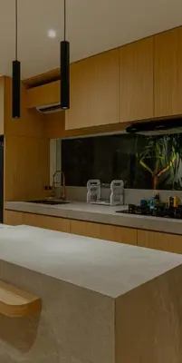 a kitchen with a sink and a counter top at Cocon Maison Timal in Kerobokan