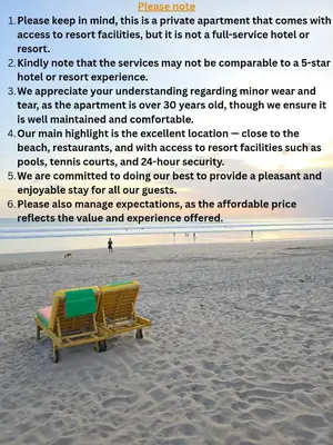 a poem about a beach chair on the beach at Classic Balinese Stay Jayakarta - 5 min walk to Kuta beach AC WiFi ! in Kuta