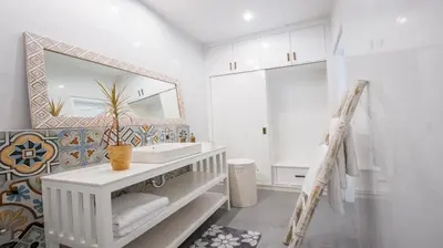 a bathroom with a sink and a mirror at New 3BR Orchid Private Pool Villa Seminyak in Seminyak