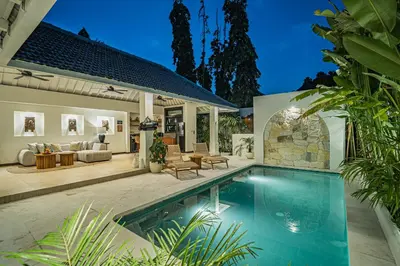 a swimming pool in the backyard of a house at Coral Heaven 1 by Bali Villa Solutions in Seminyak