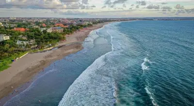 an aerial view of a beach and the ocean at SH Hotel Kuta- 20 Second to the Beach by Micky Studio in Legian