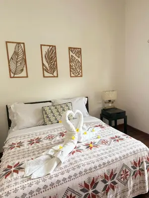 a bed with two swans made out of towels at Villa TJ Subali 3 BR privatepool close to Seminyak in Seminyak
