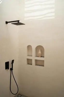 a room with a shelf with a vase on it at Villa Azura in Perean